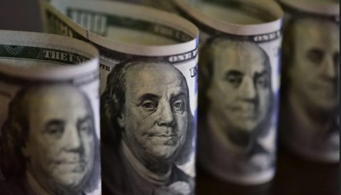 Dólar abre estável à espera de indicadores econômicos e eleições